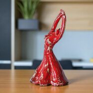 red dancer on a marble table -Photoroom (1)